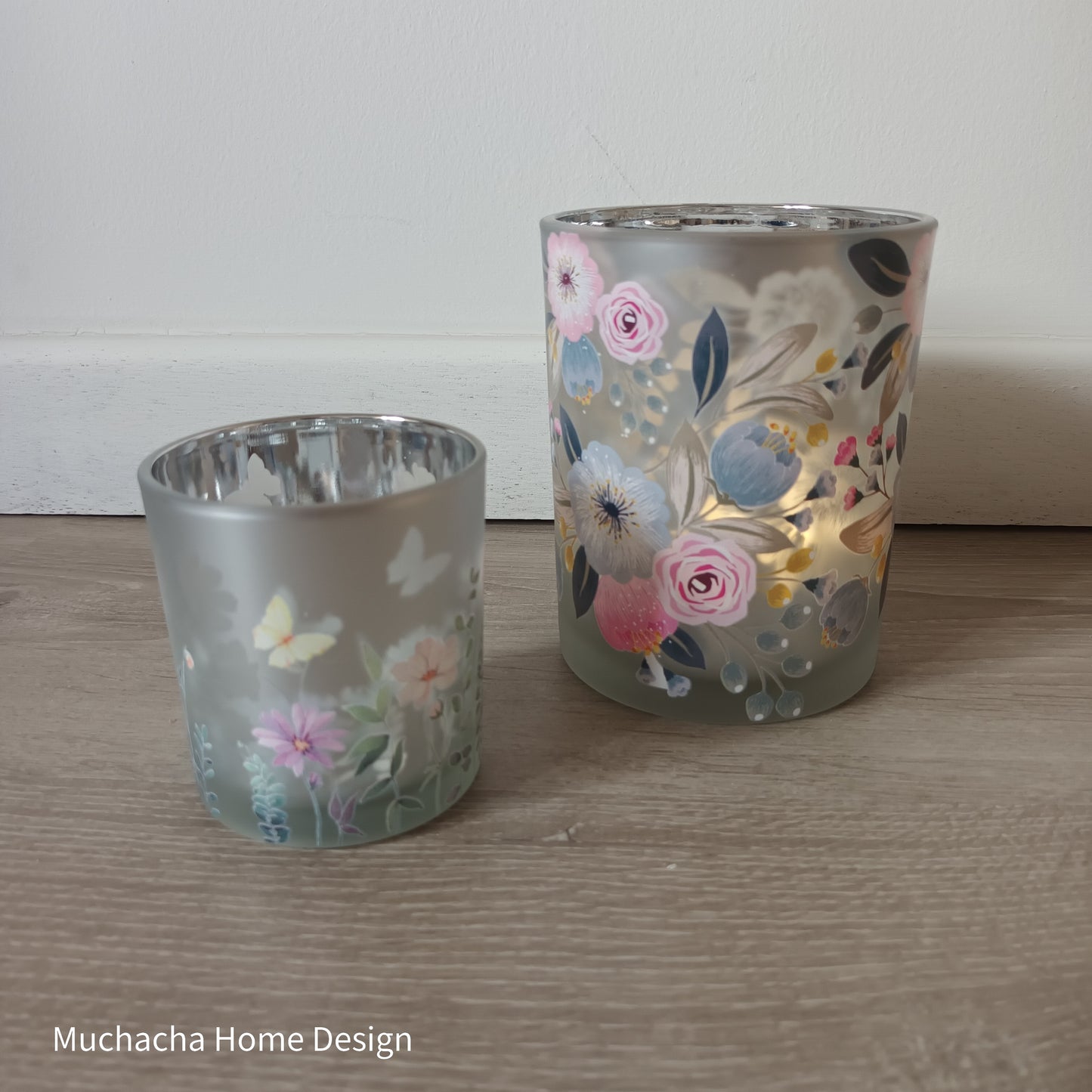 Glazen kaarsenhouder met bloemen