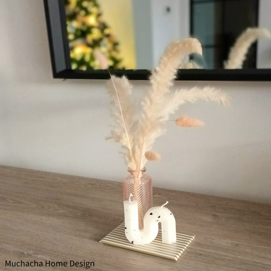 Roos vaasje met pluimen & unieke kaars